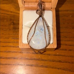 Elegant Moonstone Pendant with Copper Wire Wrap